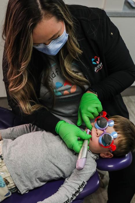 kid getting dental cleaning in Dubuque, IA