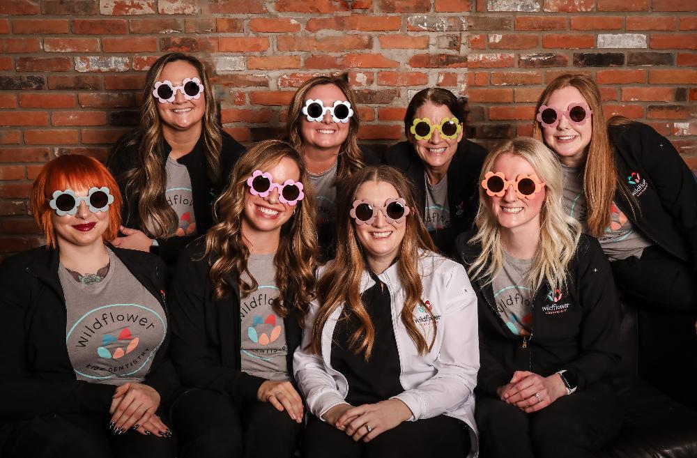 Dr Lauren Schau and team | kids dentist Dubuque, IA