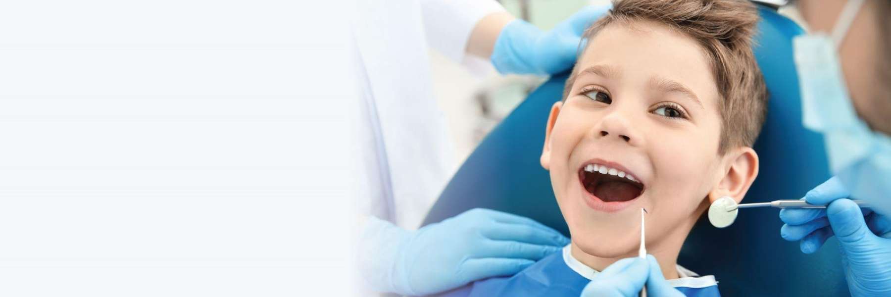 kid during dental exam in Dubuque, IA
