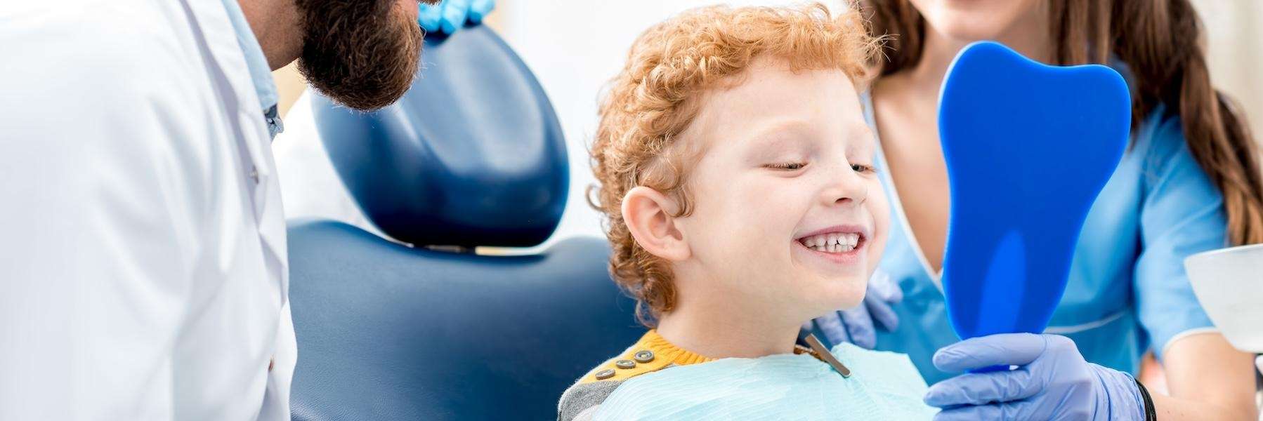 kid smiling after dental cleaning dubuque, IA