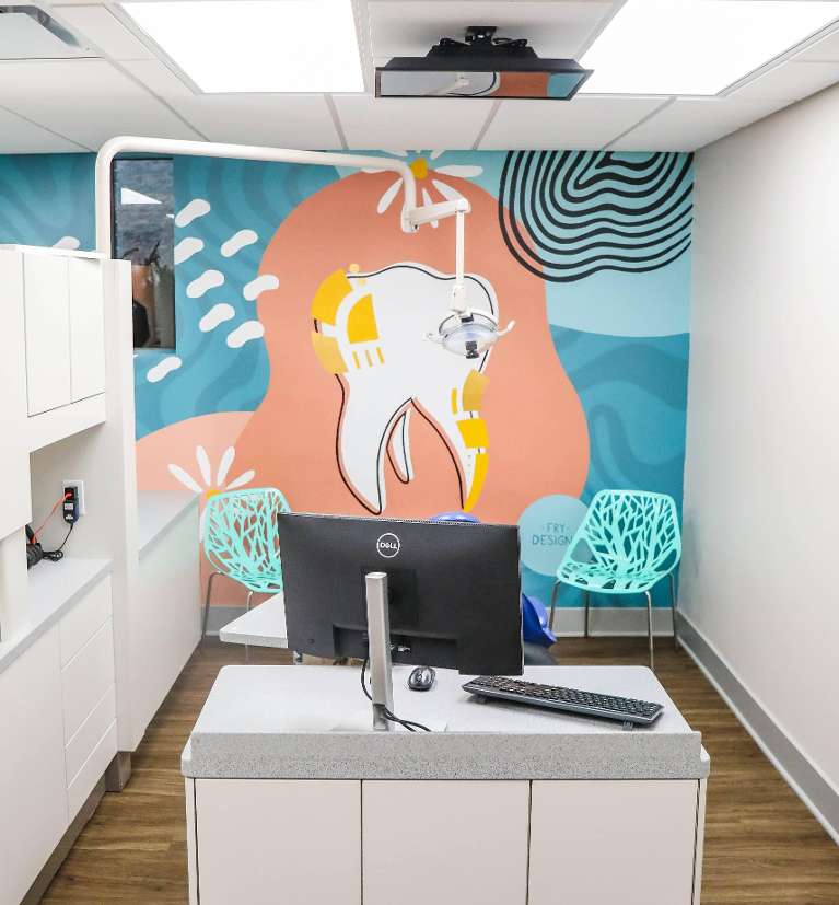 relax with TV in exam room | dubuque, IA, kids dentist